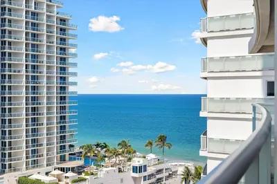 a view of the ocean from the balcony of a building at W Fort Lauderdale Corner Unit with Ocean View and Resort Access - 2BR 2BA in Fort Lauderdale