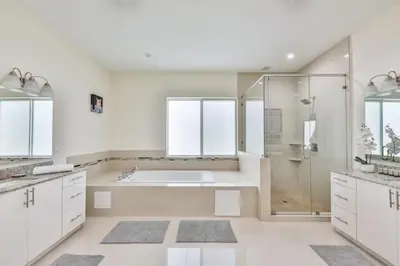 a white bathroom with a shower and a sink at Supremacy Villa STR-6110 in Davie