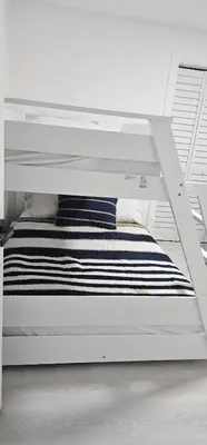 a white bunk bed in a white room at Sunrise Oasis in Sunrise