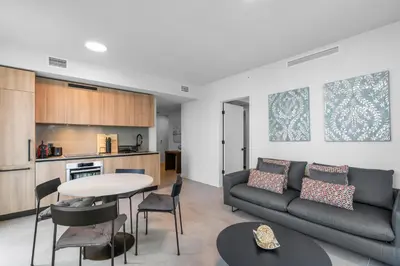 a living room with a couch and a table at Premium High-Rise Living at 501 First - Downtown Miami in Miami