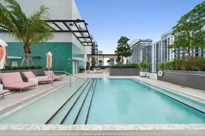 a swimming pool on the roof of a building at Sky Sanctuary with Rooftop Pool & Hot tub in Miami