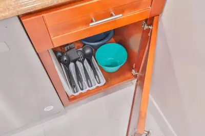 a drawer in a kitchen with cooking utensils at Chill Zona Arizona Villa Perfect Cruise Stay in Fort Lauderdale