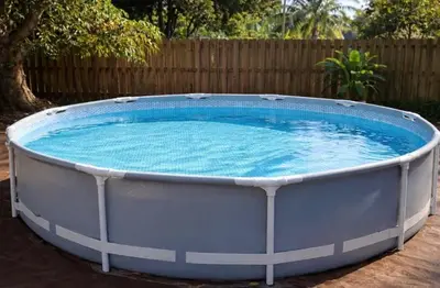 a large pool of water in a backyard at Quiet family vacation minutes from Airport in Fort Lauderdale