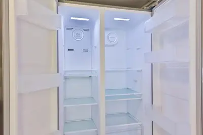 a white refrigerator with its doors open at Jungle Happiness Villa STR-2651 in Hollywood