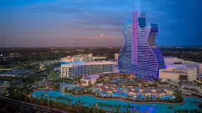 an image of a guitar shaped building with a resort at SUN VILLA Heated Pool Near Hard Rock & Beach in Hollywood