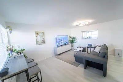 a living room with a couch and a table at Penthouse 1BR Miami Beach, amazing Ocean and Skyline views in Miami Beach