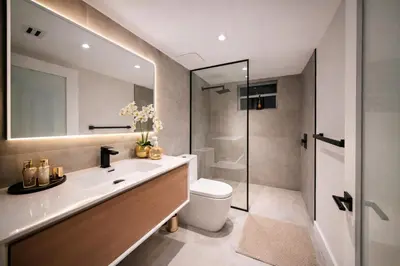a bathroom with a sink and a toilet and a shower at The Rose By Brikell in Miami