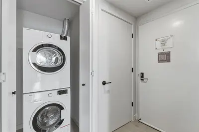 a laundry room with a washer and dryer at City View Condo - Prime Downtown Miami in Miami