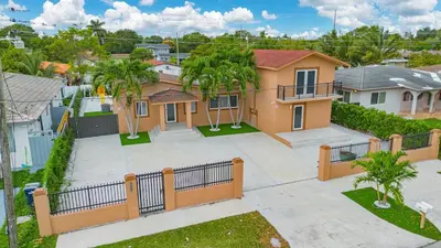 an aerial view of a house with a fence at Villa Shallat in Miami