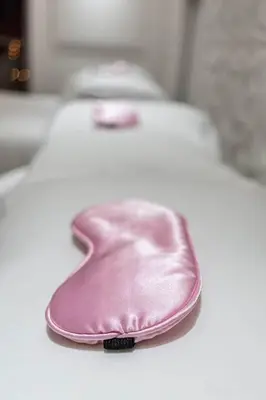 a pink purse sitting on top of a table at Versace Mansion Neighbor (Floor 1,2,3) Sleeps 21 in Miami Beach