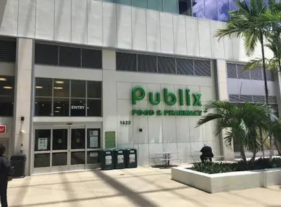 a building with a piquilia food and entertainment sign on it at Spacious 3BR-2BA Apt near Downtown-Miami Airport in Miami