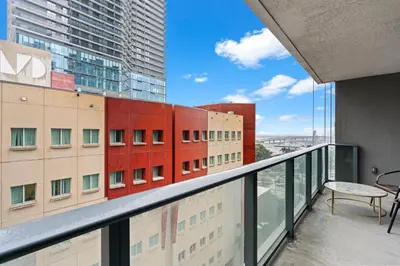 a balcony with a view of a building at The Downtown Miami 2BR 2BA Luxury Stay in Miami