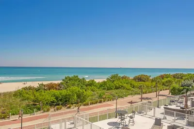 a view of the beach from the balcony of a condo at Huge Balcony Oceanfront 2 Bedrooms with Free Parking in Miami Beach