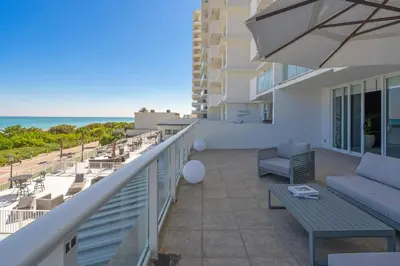 a balcony with a view of the ocean at Huge Balcony Oceanfront 2 Bedrooms with Free Parking in Miami Beach