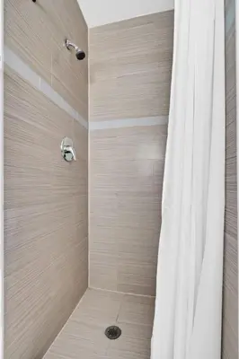 a bathroom with a shower with a shower curtain at Cozy Studio 2 Blocks from the Beach - Unit #3 in Hollywood