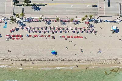 an aerial view of a beach with umbrellas at Las Olas Villa in Fort Lauderdale