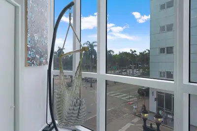 a window with a view of a parking lot at The Vizcayne Vibe- Sauna Pool and Sundeck in Miami