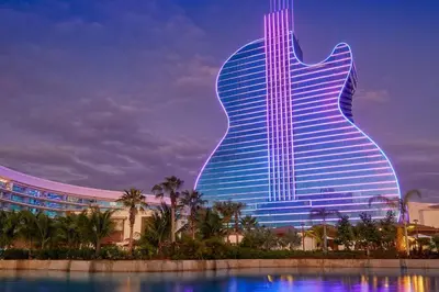a large building with a guitar shaped building at Pool & Gym | King Bed | Downtown Hollywood in Hollywood