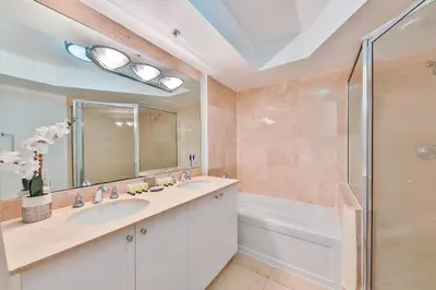 a bathroom with a sink and a shower at Blue Horizon at Sunny Isles King David in Sunny Isles Beach