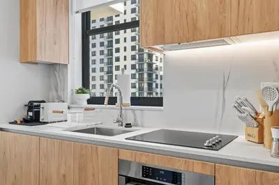 a kitchen with a sink and a window at Central Downtown Miami Condo Featuring Rooftop Pool in Miami