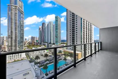 a balcony with a view of the city at City-View Condo W Pool Access & Free Parking in Miami