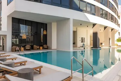 a swimming pool in a building with a building at Sky Corner Residence- Pool Parking Amenities in Miami