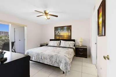 a bedroom with a bed and a ceiling fan at Le Frontenac 413 STR-03005 in Sunny Isles Beach