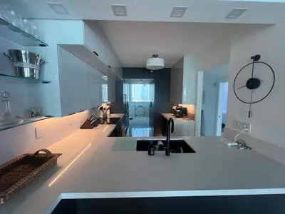 a large bathroom with a sink and a counter top at Le Marina Bay 1001 STR-01504 in Sunny Isles Beach