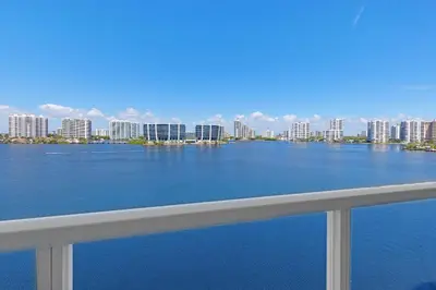 a view of a large body of water with buildings at Le Marina Bay 1004 STR-02738 in Sunny Isles Beach
