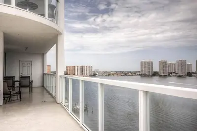 a balcony with a view of the water at Le Marina Bay 1109 STR-01972 in Sunny Isles Beach