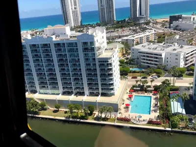 an aerial view of a resort with a swimming pool at Le Marina Bay 407 STR-01404 in Sunny Isles Beach