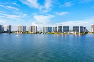 a large body of water in front of a city at Le Marina Bay 603 STR-02736 in Sunny Isles Beach