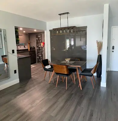 a dining room with a table and chairs at Marbella Tower 706 STR-02489 in Sunny Isles Beach