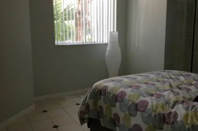 a bedroom with a bed and a window at Le Montcalm 102 STR-01921 in Sunny Isles Beach
