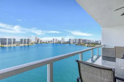 a balcony with a view of the water at Le Marina Bay PH3 STR-01487 in Sunny Isles Beach