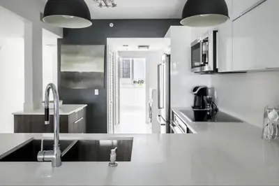 a kitchen with a sink and a counter top at Le Marina Bay 810 STR-01434 in Sunny Isles Beach