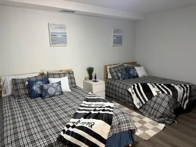 two beds in a room with two beds sidx sidx sidx sidx at Modern private efficiency Miami Gardens in Miami Gardens