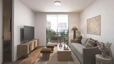a living room with a couch and a tv at New Luxury Hotel in Edgewater • 3 Suites • Rooftop Pool Sense28 by AvantStay in Miami
