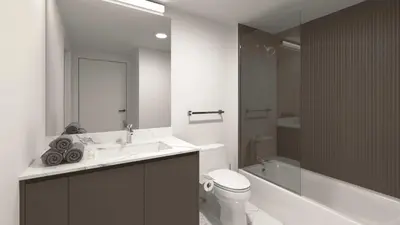 a bathroom with a sink and a toilet and a tub at New Luxury Hotel in Edgewater • 3 Suites • Rooftop Pool Sense28 by AvantStay in Miami