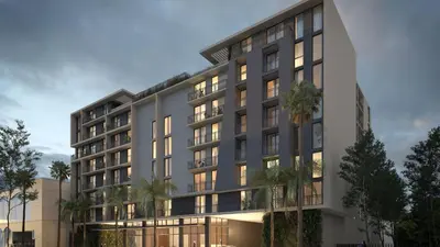 a rendering of a building with palm trees in front at New Luxury Hotel in Edgewater • 3 Suites • Rooftop Pool Sense28 by AvantStay in Miami