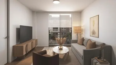 a living room with a couch and a tv at New Luxury Hotel in Edgewater • 3 Suites • Rooftop Pool Sense28 by AvantStay in Miami