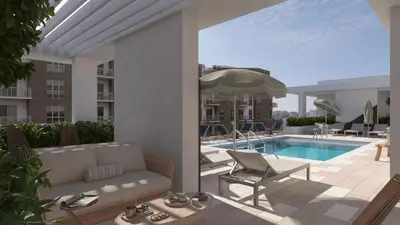 a patio with a couch and a swimming pool at New Luxury Hotel in Edgewater • 2 Suites • Rooftop Pool Sense28 by AvantStay in Miami