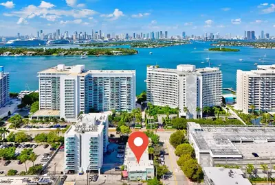 an aerial view of a city with a red marker at 1BR Miami Beach Apt with King plus 2 Queens & Smart TV in Miami Beach