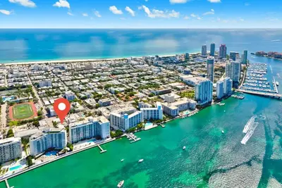 an aerial view of a city with a harbor at 1BR Miami Beach Apt with 3 Queens plus Free Parking in Miami Beach