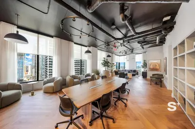 an office with a large wooden table and chairs at Cozy and Spacious Studio in Miami City Views in Miami