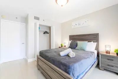 a bedroom with a large bed in a room at Bright Escape Near Hot Spots in Miami