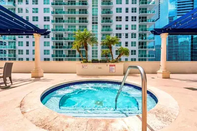 a hot tub on the roof of a building at Studio W Panoramic Views Prime Comfort in Miami