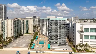 an aerial view of a city with buildings at Great 2BR Condo-DIRECT BEACH ACCESS Pool, Gym and FREE Parking in Hollywood