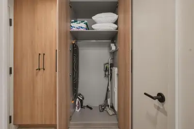 a bathroom with a closet with towels in it at New Luxury Studio Downtown Miami Prime Location in Miami