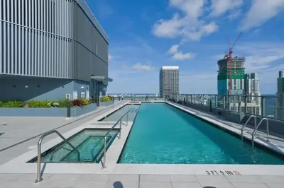 a swimming pool on the roof of a building at New Luxury Studio Downtown Miami Prime Location in Miami
